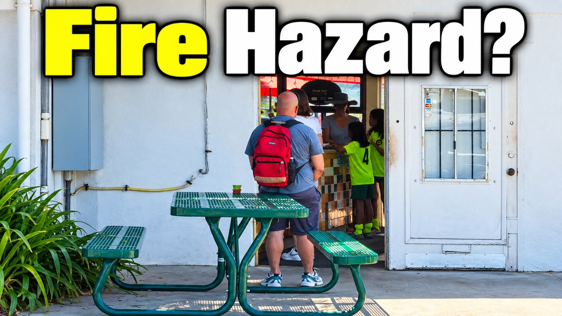 Table blocking the entrance — possible fire hazard